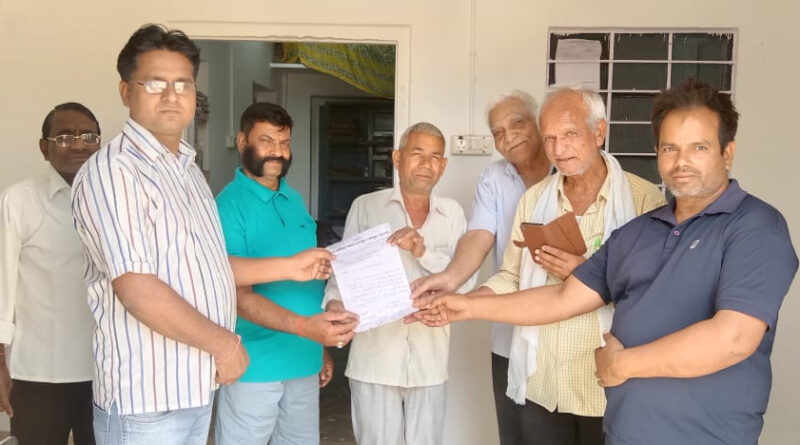 a group of men holding a piece of paper
