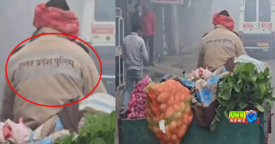 A young man selling vegetables wearing a police jacket in Khurja