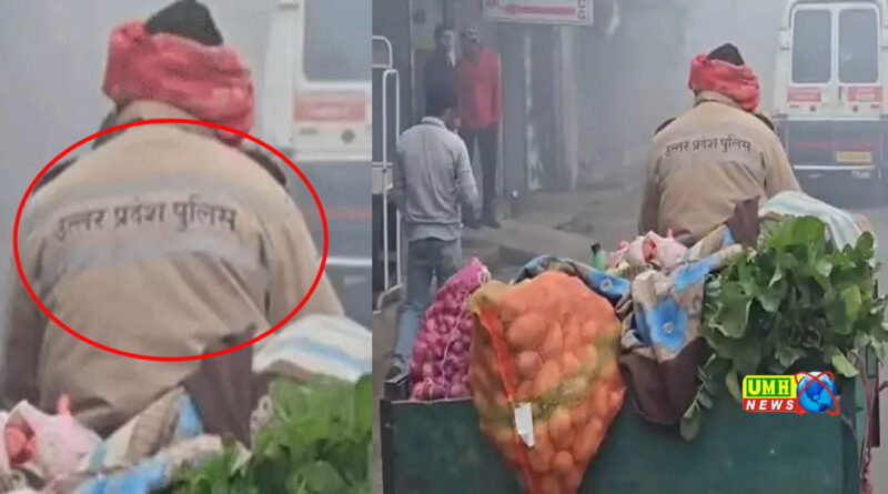 A young man selling vegetables wearing a police jacket in Khurja